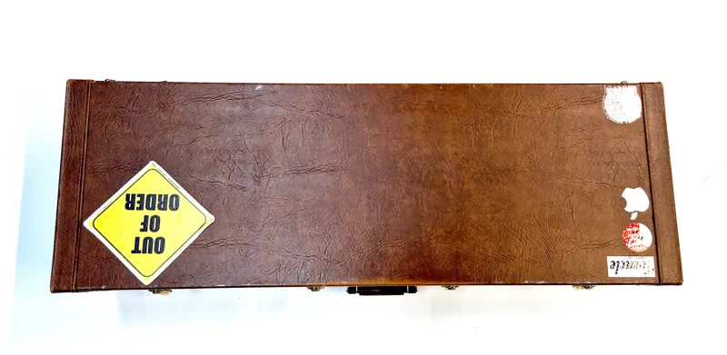 Pre-owned baritone saxophone hard case.